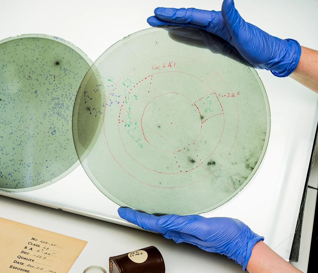 Glass plates taken at the Armagh-Dunsink-Harvard Telescope in Bloemfontein, South Africa, in 1950 and 1951 were annotated by hand.